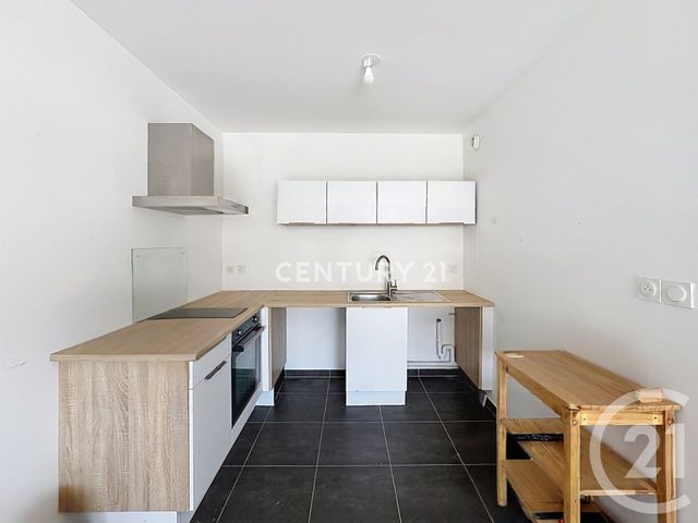 Appartement T2 à louer - 2 pièces - 48.56 m2 - AURIOL - 13 - PROVENCE-ALPES-COTE-D-AZUR - Century 21 Agence Beaumond